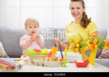 Baby and mother having fun on Easter Stock Photo
