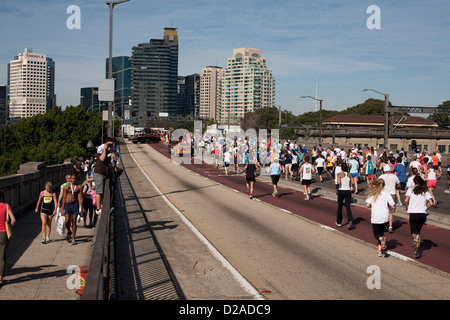Thousands of fitness enthusiasts taking part in a Charity fun run across the Sydney Harbour Bridge Australia Stock Photo