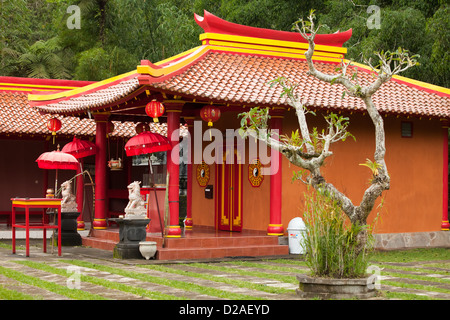 Red hindu temple and gardens in Bali in Indonesia
