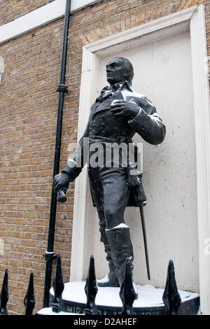 London, UK. 18/01/13. Snow covers a statue of Charles FitzRoy, 2nd Duke of Grafton, as snow falls in Central London. Stock Photo