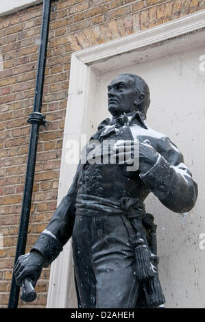 London, UK. 18/01/13. Snow covers a statue of Charles FitzRoy, 2nd Duke of Grafton, as snow falls in Central London. Stock Photo