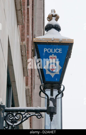 London, UK. 18/01/13. A sign outside Whitfield Street Police station is covered in snow, as snow falls in Central London. Stock Photo