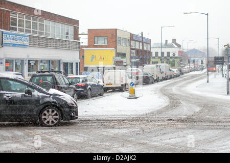 Birmingham, UK. 18th Jan, 2013. Snow causing traffic disruption in Birmingham City Centre as most of Birmingham's workers leave early. Stock Photo