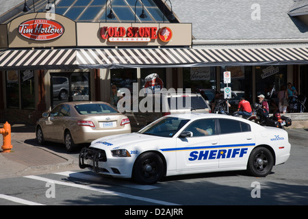 The sheriff's police car parked outside the Cold Stone Creamery and Tim Hortons in Halifax Stock Photo