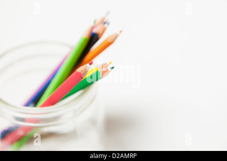 Close up of colored pencils in jar Stock Photo