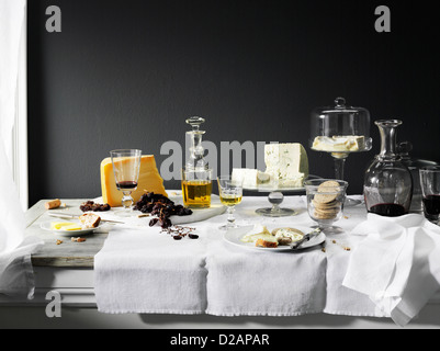 Wine, cheese and bread on table Stock Photo