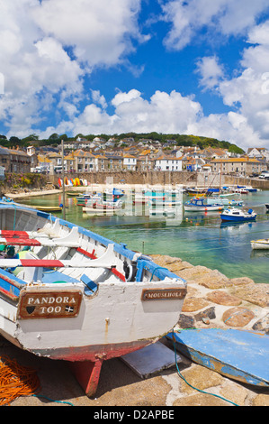 Mousehole Cornwall Small fishing boats in Mousehole harbour Cornwall England GB UK Europe Stock Photo