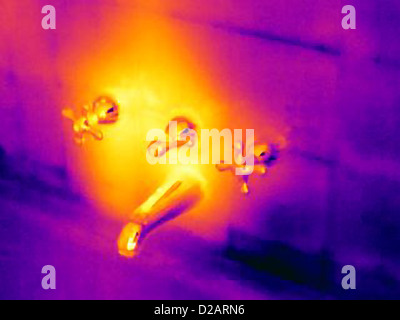 Thermal image of bath faucet Stock Photo