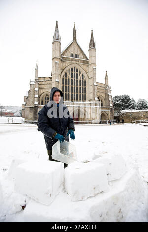 Artist and swimming teacher James Mulhall, 40, builds his first ever igloo in front of Winchester Cathedral. WINCHESTER, UK, 18th Jan, 2013. Stock Photo