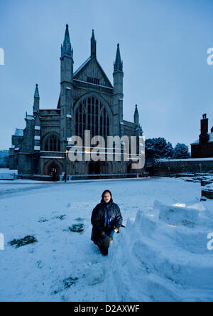 Artist and swimming teacher James Mulhall, 40, builds his first ever igloo in front of Winchester Cathedral. WINCHESTER, UK, 18th Jan, 2013. Stock Photo
