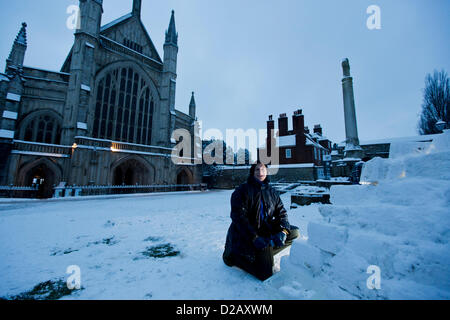 Artist and swimming teacher James Mulhall, 40, builds his first ever igloo in front of Winchester Cathedral. WINCHESTER, UK, 18th Jan, 2013. Stock Photo