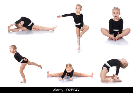 Little girl gymnast on a white background Stock Photo