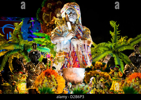 Dancers of Imperatriz samba school perform on a float during the Carnival parade at the Sambadrome in Rio de Janeiro, Brazil. Stock Photo