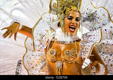 A dancer of Imperatriz samba school performs during the Carnival parade at the Sambadrome in Rio de Janeiro, Brazil. Stock Photo