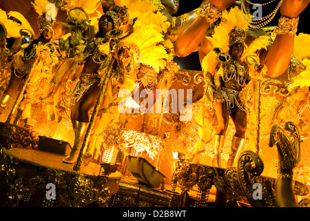 Dancers of Imperatriz samba school perform on a float during the Carnival parade at the Sambadrome in Rio de Janeiro, Brazil. Stock Photo