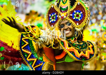 A dancer of Imperatriz samba school performs during the Carnival parade at the Sambadrome in Rio de Janeiro, Brazil. Stock Photo