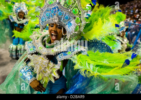 A dancer of Imperatriz samba school performs during the Carnival parade at the Sambadrome in Rio de Janeiro, Brazil. Stock Photo