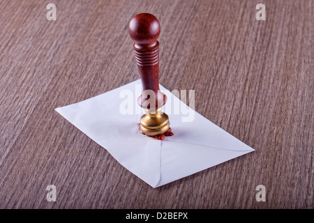 White envelope for a letter, with sealing wax stamp Stock Photo