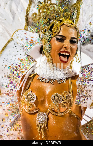 A dancer of Imperatriz samba school performs during the Carnival parade at the Sambadrome in Rio de Janeiro, Brazil. Stock Photo