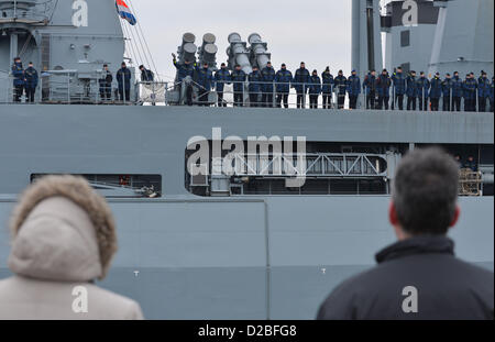 Family members say good bye to the crew of the frigate 'Hessen' as it leaves the naval base in Wilhelmshaven, Germany, 19 January 2013. For the first time, the frigate is flagship of a Nato task force. Photo: Carmen Jaspersen Stock Photo