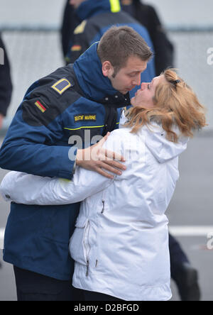 Crew member Mathias Greif says good bye to his girlfriend on deck of the frigate 'Hessen' before it leaves the naval base in Wilhelmshaven, Germany, 19 January 2013. For the first time, the frigate is flagship of a Nato task force. Photo: Carmen Jaspersen Stock Photo