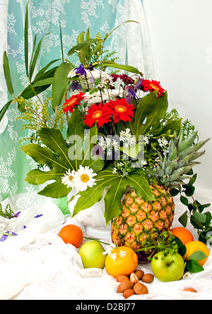 Still life with Bouquet of summer flowers in basket Stock Photo - Alamy