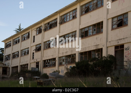 A vandalized abandoned building at Fort Ord, in Seaside, California.  This was once a thriving military base. Stock Photo