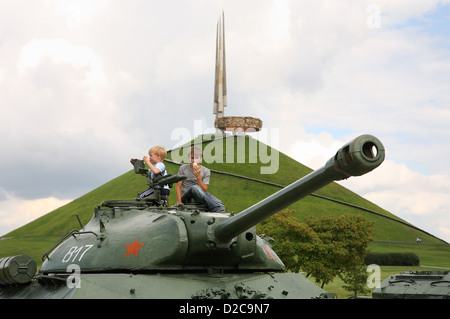 Minsk, Belarus, boys on an old T34 tanks at the monument in honor of the Soviet Army Stock Photo