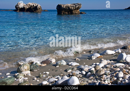 Pebble beach at the Aegean coast of Pelion Peninsula Stock Photo