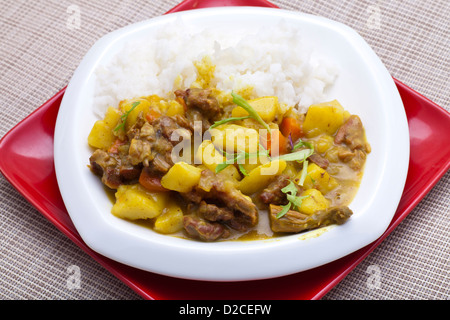 Curry beef and vegetable is a kind of braised spice food with carrot and potato. Stock Photo