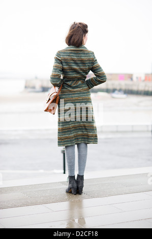 Pretty model wearing Vintage Striped 1960's Skirt Suit Stock Photo