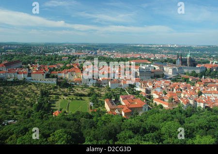 View over Prague city from the top of the observation tower on Petrin Hill. Prague Castle can be seen in the middle distance. Stock Photo