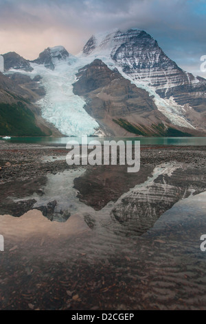 Mount Robson with morning clouds reflected in a pool near Berg Lake, Robson Provincial Park, British Columbia Stock Photo