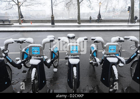 Westminster Embankment, London, UK. 20th January 2013. Snow on 'Boris Bikes'. Snow falls in central London. Alamy Live News Stock Photo