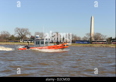 US Coast Guard Maritime Safety and Security Team pass the Washington Monument during a security patrol along the Potomac River for the presidential inaugural in Washington January 19, 2013. Stock Photo