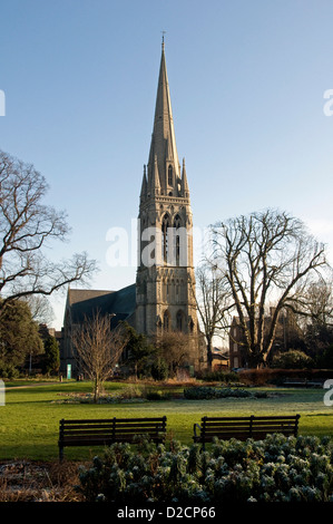 St. Mary's New Church with benches and frosted plants in foreground Clissold Park Stoke Newington London England UK Stock Photo