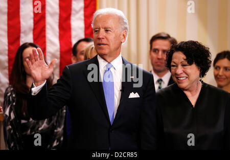 United States Vice President Joe Biden (L) after taking the oath of office from Supreme Court Justice Sonia Sotomayor (R) at the U.S. Naval Observatory in Washington January 20, 2013. .Credit: Kevin Lamarque / Pool via CNP Stock Photo