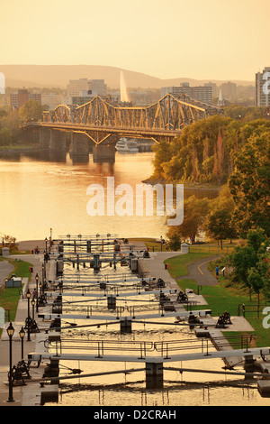 Ottawa sunset over river with historical architecture. Stock Photo