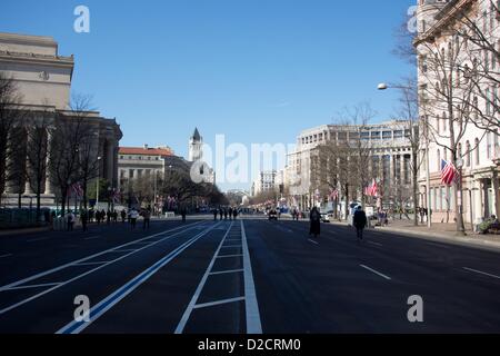 January 20, 2013, Washington DC. Washington visitors stroll along Pennsylvania Avenue which is closed to vehicular traffic in preparation for the inauguration ceremony of President Barack Obama.  The president was officially sworn in today due to a constitutional requirement that presidents be sworn in before noon on January 20. Stock Photo