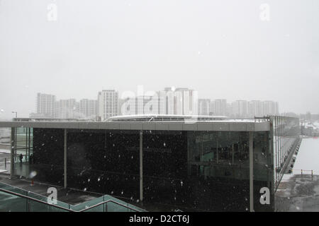 Stratford, London, UK. 20th January 2013. Stratford International station with the Olympic athletes village in the distance during heavy snow. Stock Photo