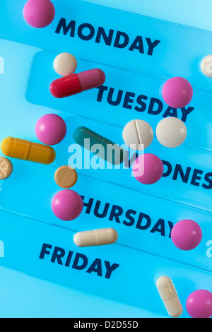 Pills and pill box Stock Photo