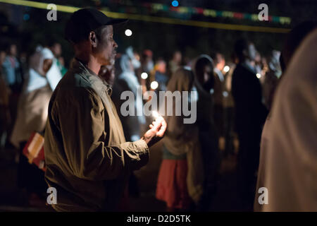 ADDIS ABABA, ETHIOPIA– JANUARY 19: A large crowd of people sing and chant while accompanying the Tabot, a model of the arc of covenant, during Timket (baptism in Amharic) celebrations  on January 19, 2013 in Addis Ababa. Stock Photo