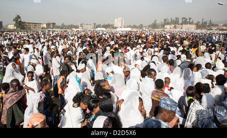 ADDIS ABABA, ETHIOPIA– JANUARY 19: A large crowd of people attending Timket celebrations of Epiphany, commemorating the baptism of Jesus in the river of Jordan, on January 19, 2013 in Addis Ababa.