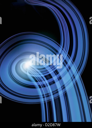 Light trails creating an abstract blue pattern on a black background Stock Photo