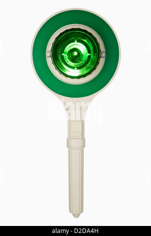 A green handheld police traffic control sign Stock Photo