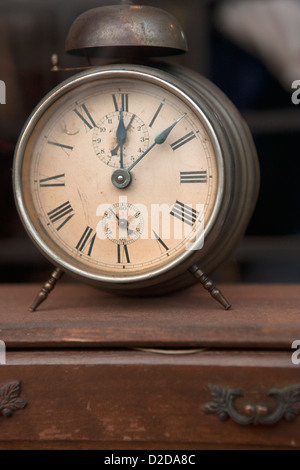 Alarm clock in shop on chest of drawers Stock Photo