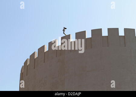 Modern security camera placed on old arabesque fort Stock Photo