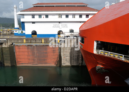 The bow of a cargo boat entering the Gatun Lock, the first lock on the Atlantic side of Panama Canal Stock Photo