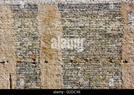 Big brick yellow retro wall background texture -thousand clay bricks on one picture concept Stock Photo