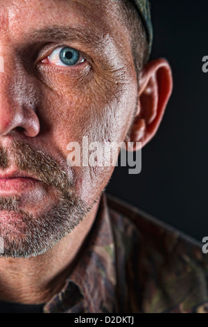 Gritty look, very detailed close up portrait of mature adult, half face, male, 40 years, Caucasian Stock Photo